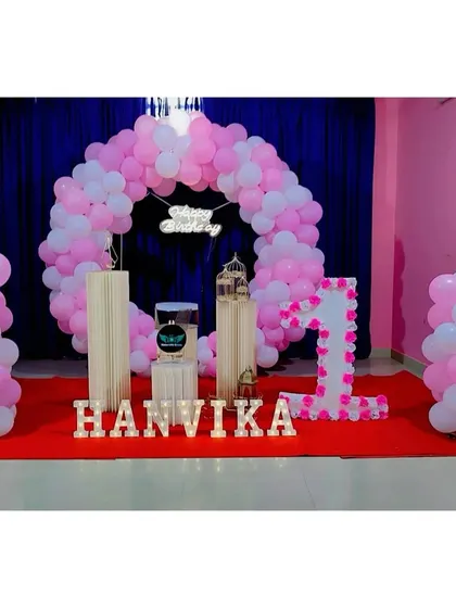 A collage of 'Welcome Baby' home decorations, including balloons, wall decals, and foil balloons.