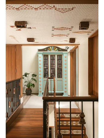 Another shot of the beautiful, Chettinad-style bar cabinet, with its mint green and ochre accents.