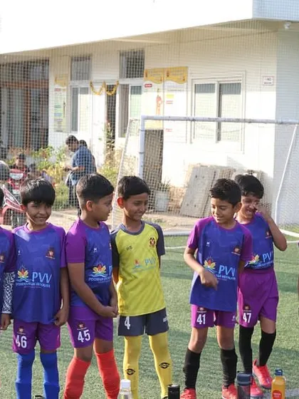 Team spirit starts early. Young players in our grassroots program stand together, learning the importance of unity and teamwork from their very first day.