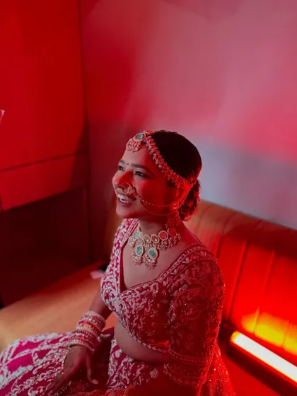 A joyful laugh that lights up the room. Her makeup is designed to look stunning even in unique and dramatic lighting conditions.