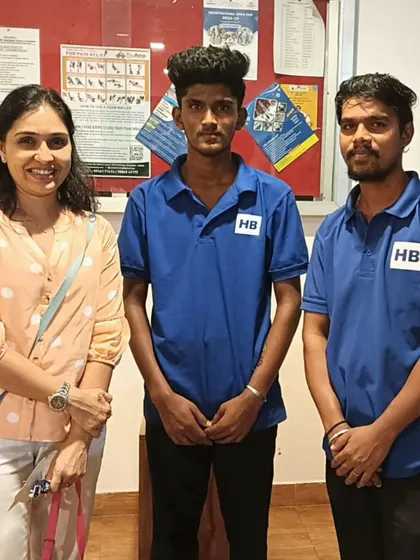 Two of our team members posing with a happy client, reflecting the friendly and positive relationships we build.