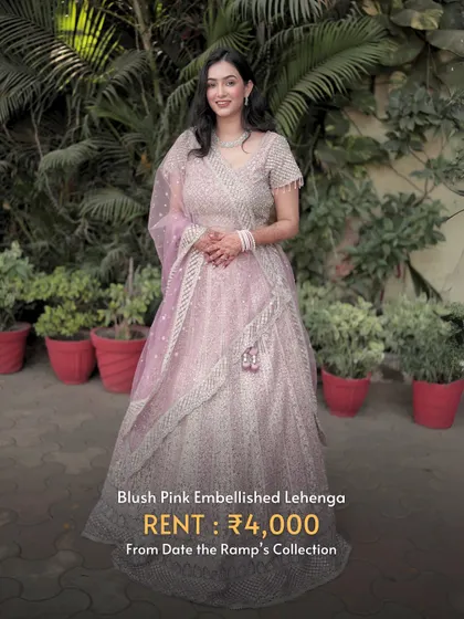 A soft and dreamy blush pink embellished lehenga. This is a graceful and elegant option for any pre-wedding event.
