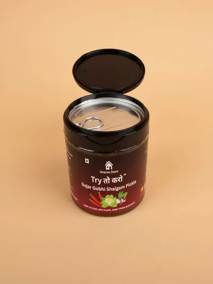 An open-lid shot of the Gajar Gobhi Shalgam Pickle.