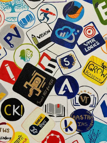 This close-up highlights the intricate detail and steady hand required to paint so many unique logos on one canvas.