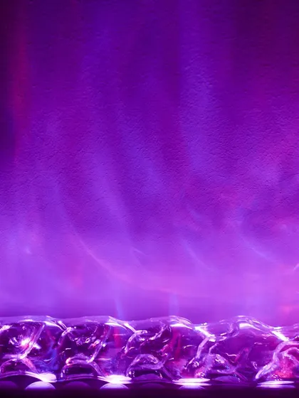 Create a dramatic mood with our Aurora Borealis-inspired wall wash light. This fixture uses a special lens to cast a vibrant, colorful light effect that mimics the northern lights, perfect for creating a unique ambiance in media rooms or lounges.