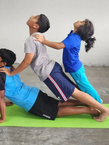 A wonderful example of a three-person stack, building on a foundational pose to create something new and challenging.