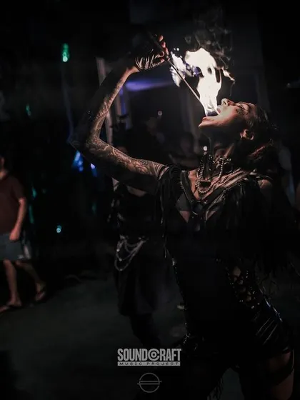 A demonstration of fire eating, one of our most spectacular and daring tricks. This act always captivates the audience and showcases extreme skill and bravery.