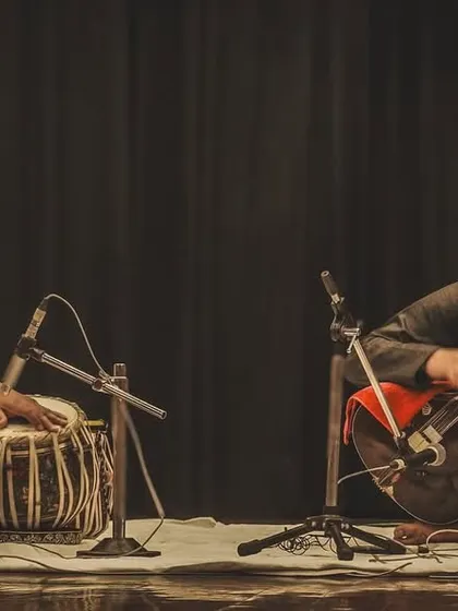 The dynamic energy of a live performance captured in a single frame. Here, Pt. Ram Kumar Mishra Ji and I are completely absorbed in the flow of the music.