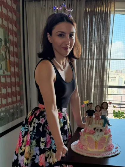 Actress Soha Ali Khan with the special birthday cake her daughter Inaaya helped design. We brought Inaaya's vision to life with custom toppers of the family.