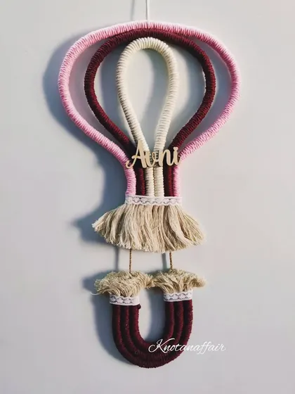 How cute is this macrame hot air balloon? I made this piece with a custom name 'Avni' for a client in Australia. It’s a whimsical and unique decoration that adds a sense of adventure to a nursery or playroom. The colors and name are fully customizable.