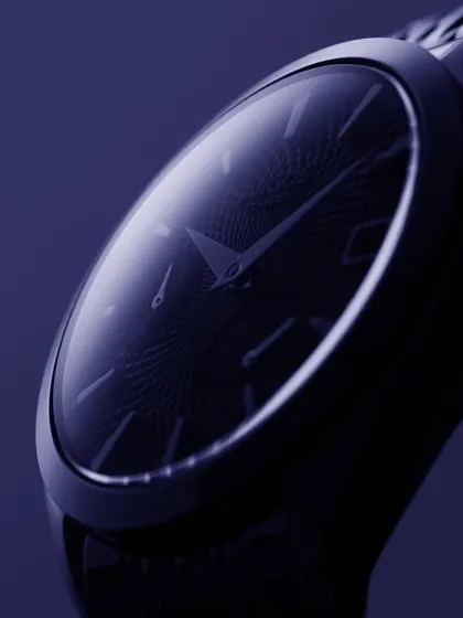 A moody, atmospheric close-up of the Argos Olympus. The deep blue monochrome lighting creates a sense of mystery and focuses entirely on the watch's form and the subtle texture of the dial. It’s about evoking a feeling, not just showing a product.