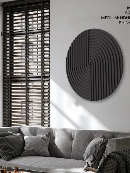 The same circular design in a shiny black finish, shown in a modern living room. This image includes details on size, medium, and finish for customer reference.