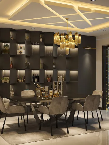 A well-designed space can boost productivity and mood. This dark, luxurious dining room with integrated shelving and a statement chandelier creates a sophisticated and focused atmosphere.