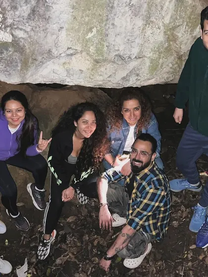 The tribe gathered together during a cave exploration on one of our treks. We mix adventure with moments of quiet connection, creating memories that last a lifetime.