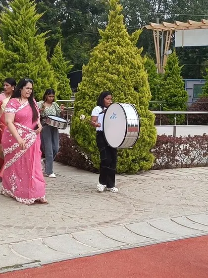 The school band leads a procession to welcome our teachers, making them feel special from the moment they arrive.