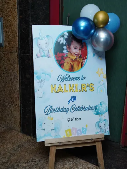 A personalized welcome sign for Kalki's elephant-themed birthday celebration, guiding guests to the party floor.