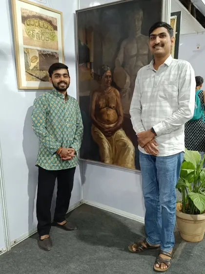 Standing with my award-winning painting "Contrast of life" at the 36th All India Lokmanya Tilak Exhibition in Pune.