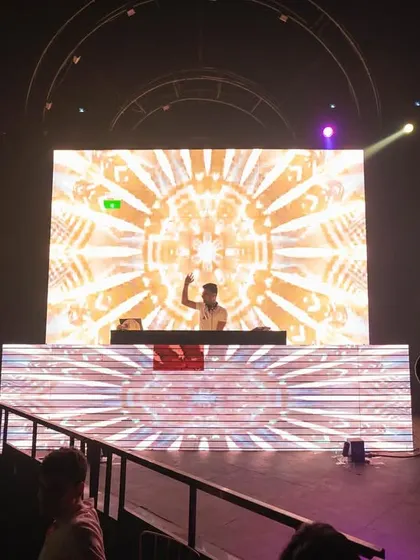 The view from the dance floor, looking up at the massive LED wall and DJ console. The visuals are an essential part of the story I tell with my music.