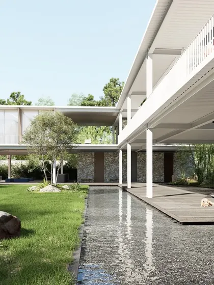 This view shows the clubhouse's long, floating form alongside a tranquil water body. The white steel structure and open design create a feeling of lightness and transparency, making it a welcoming heart for the gated community.