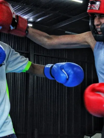 An intense exchange between two of our boxers. Sparring is a physical chess match, and every session is a chance to sharpen your strategy.