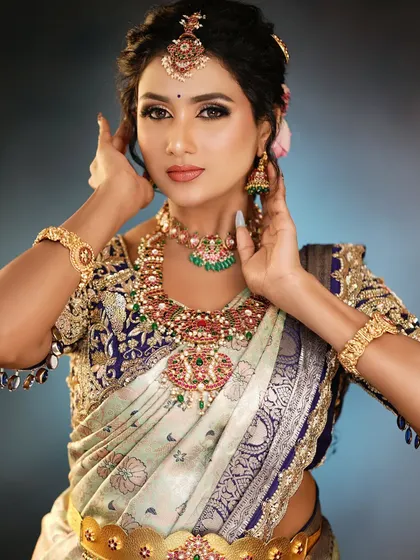We teach how to pose models for portfolio shoots to best display the makeup, hair, and outfit.