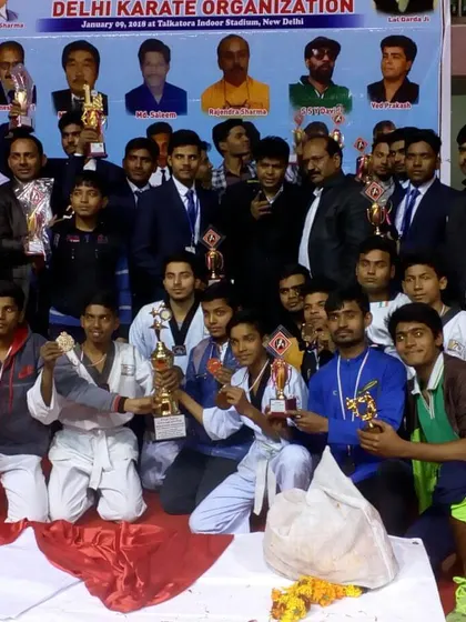 A group photo of our entire delegation of champions and instructors at the national karate organization event.
