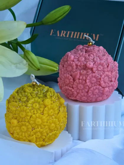 This set features a cheerful yellow and a soft pink daisy ball candle. They are perfect for spring decor or for anyone who loves a touch of floral charm.