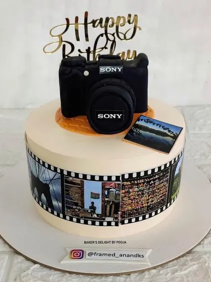 Another angle of the camera cake, showing the detail on the lens and body. It's the perfect gift for someone who loves to capture life's moments.