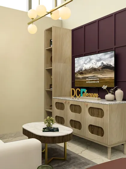 This living room from our Gurugram Experience Centre showcases a beautiful TV unit with a unique oval-patterned console and a bold purple accent wall.