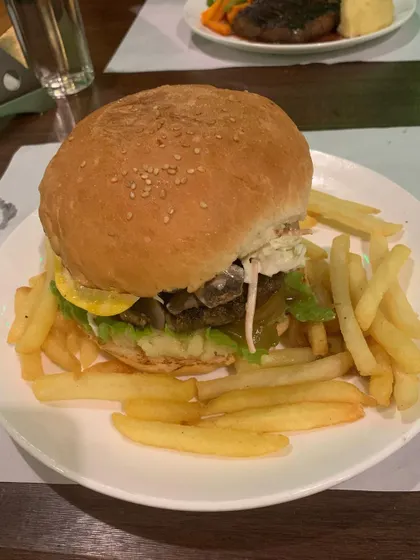 Yes, you can even have a burger. The key is balance. A healthy lifestyle doesn't mean you can never eat your favorite foods; it means you learn how to fit them in without losing progress.