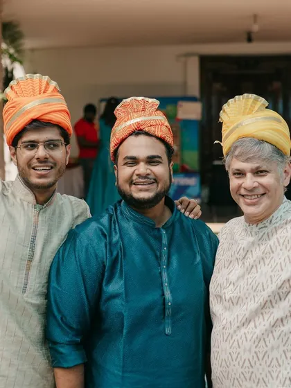 A group of men proudly wearing their turbans, ready to participate in the wedding festivities.
