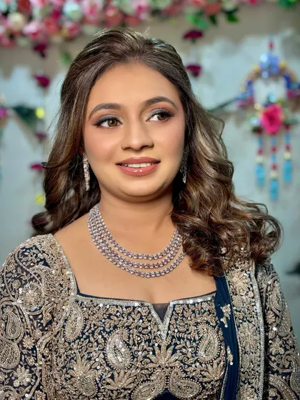 A close-up of the sangeet makeup, highlighting the blended smokey eye and the radiant skin finish.