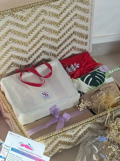 A look inside the Women's Day hamper for Adani Connex. Each basket was filled with a personalized bag, a furoshiki-wrapped gift, and other thoughtful items.
