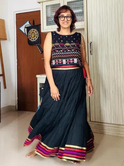My work-from-home outfit. This comfy long skirt and crop top are old favorites that I've kept for years, proving that good style is timeless.