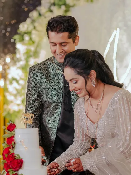 The cake-cutting ceremony, a sweet start to their new life together.