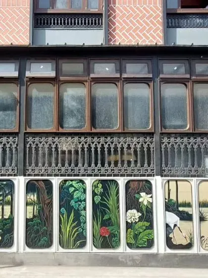 The finished piece at Ssura Koramangala. After fighting the rain, we completed this beautiful series of floral and bird paintings on exterior panels. It's a testament to our team's dedication.