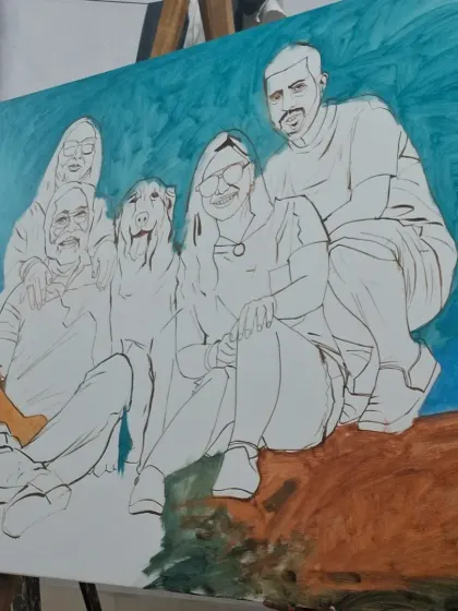 Here, the initial sketch for a family group portrait is complete, and I have begun blocking in the background colors. This layering technique helps to create depth and atmosphere in the final piece.