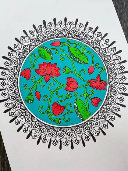 A divine fusion of Pichwai and Mandala art. I loved incorporating the traditional lotus motifs of Pichwai painting within a mandala structure. The vibrant teal background makes the pink lotuses pop.
