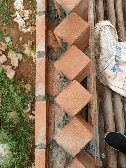 A close-up of the bricklaying process.