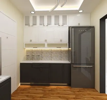 A kitchen concept showing dark lower cabinets and white upper cabinets, with an integrated refrigerator for a seamless look.