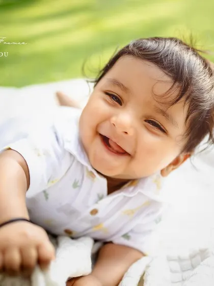 The purest smile, captured in the warm sunshine. Outdoor sessions are perfect for capturing these bright and happy moments.
