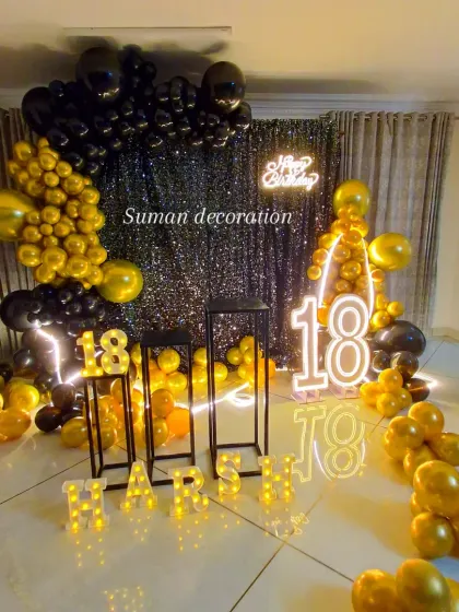 The full black and gold 18th birthday setup, personalized with the name 'Harsh' in marquee letters.