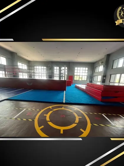 Another view of the action training area, showing the extensive matting and equipment available for various fitness disciplines like parkour and gymnastics.