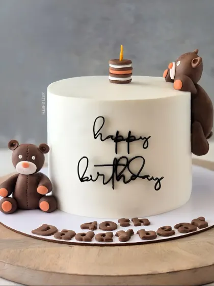 A minimalist teddy bear cake for a "Daddy Bear's" 40th birthday. This 1kg chocolate mousse cake is simple, sweet, and full of love.