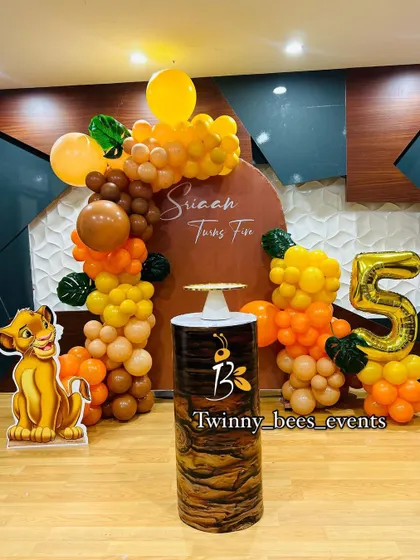 A Lion King theme for Sriaan's fifth birthday. We used a warm, earthy color palette for the balloon arch and a custom backdrop, complete with a Simba cutout and a number '5' foil balloon.
