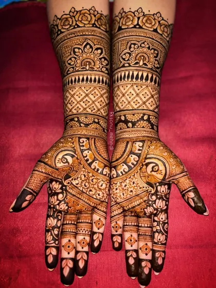 This stunning ring ceremony design is filled with beloved traditional symbols. I combined floral patterns with peacock and elephant motifs to create a rich, celebratory look perfect for an engagement.