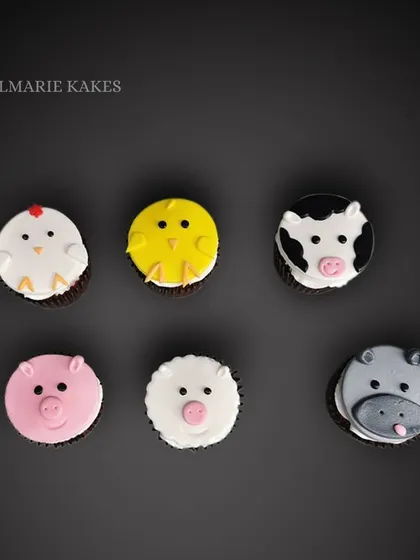 These farm and wild animal themed cupcakes are a hit for first birthdays. I make these simple but cute animal faces from fondant, including a pig, chick, cow, and hippo. They are a fun way to delight the little ones.