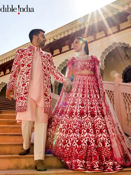 My photo of a couple on the steps of a palace, used by Incredible India to promote the regal charm of Jaipur weddings.