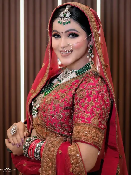 A happy and radiant portrait of the bride. Her genuine smile and the bright, clean lighting make this a timeless and heartwarming shot.