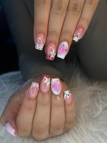 A fun, playful set with a mix of hand-painted stars, bows, and a pink ombré effect.